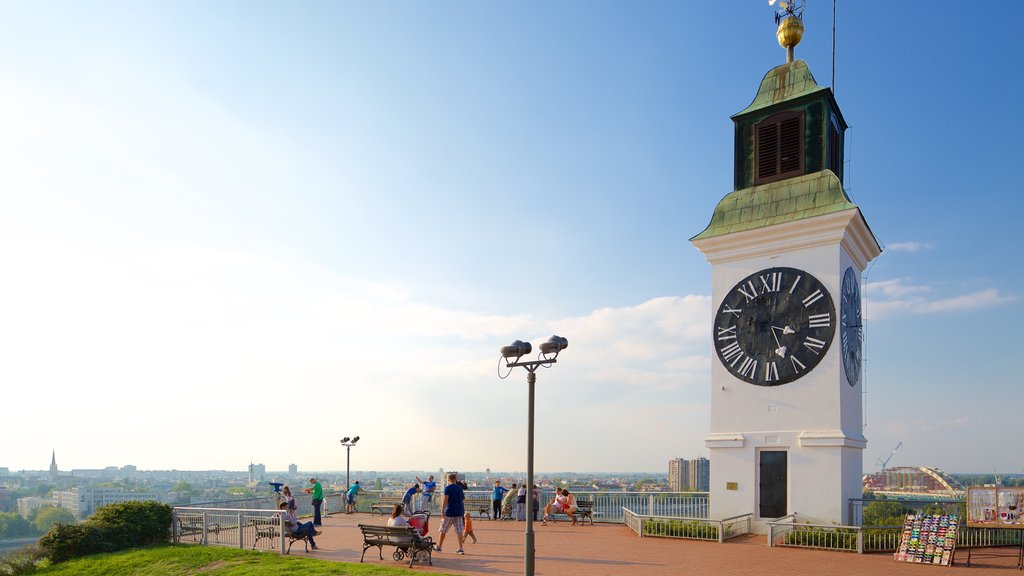 Petrovaradin Fortress showing views as well as a small group of people