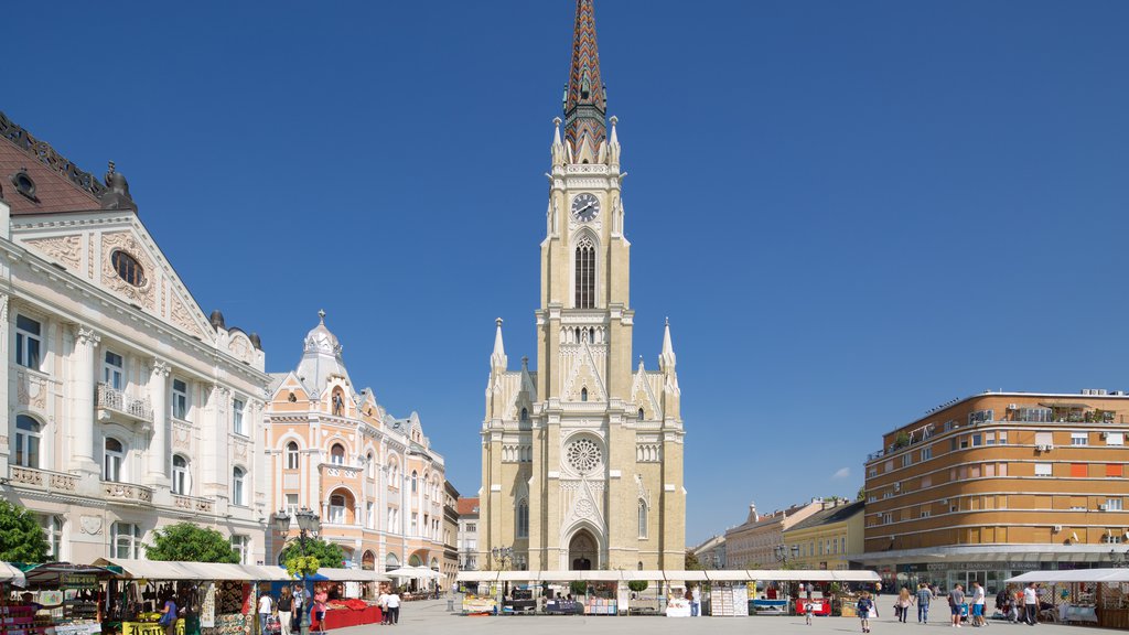 Church of the Virgin Mary featuring a square or plaza, heritage architecture and street scenes