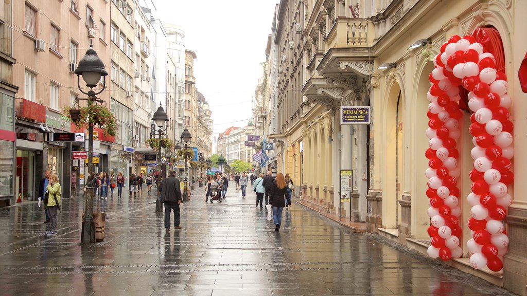 Knez Mihailova Street which includes a city and street scenes as well as a large group of people