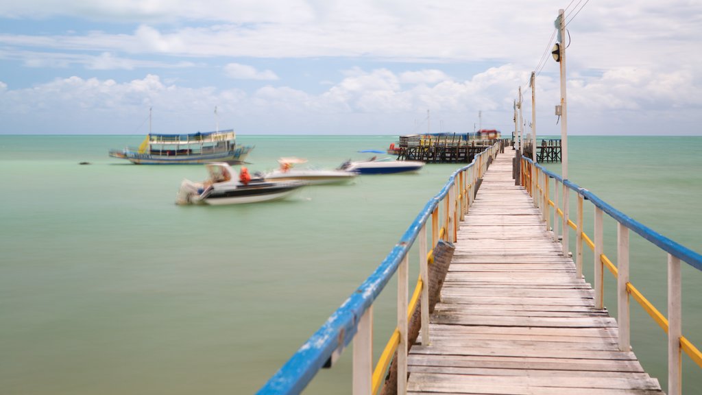 Pirangi Beach which includes general coastal views and boating