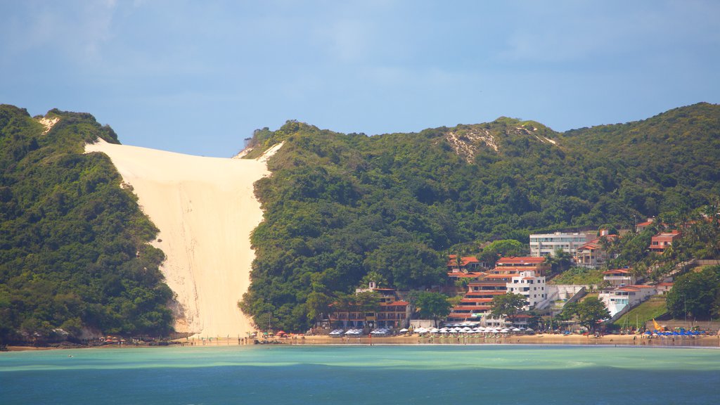 Ponta Negra Beach which includes a coastal town and general coastal views