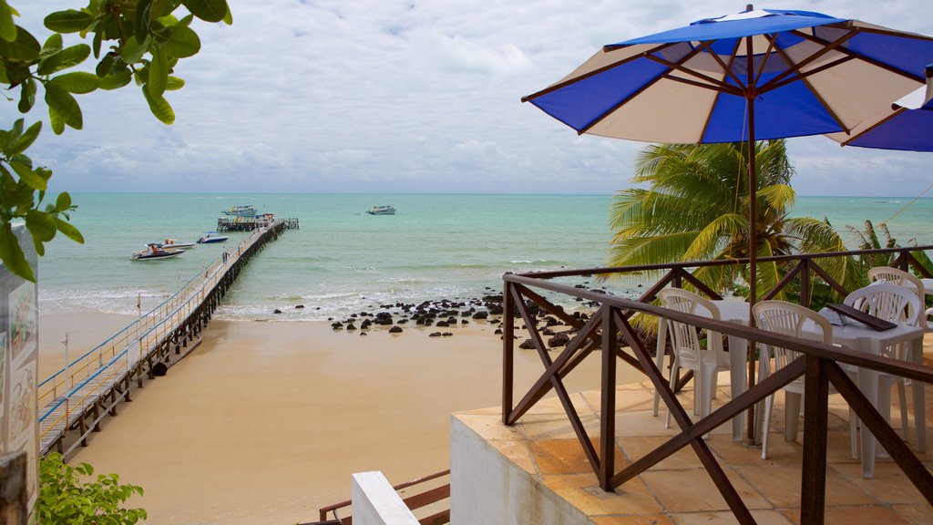 Pirangi Beach which includes general coastal views and a beach