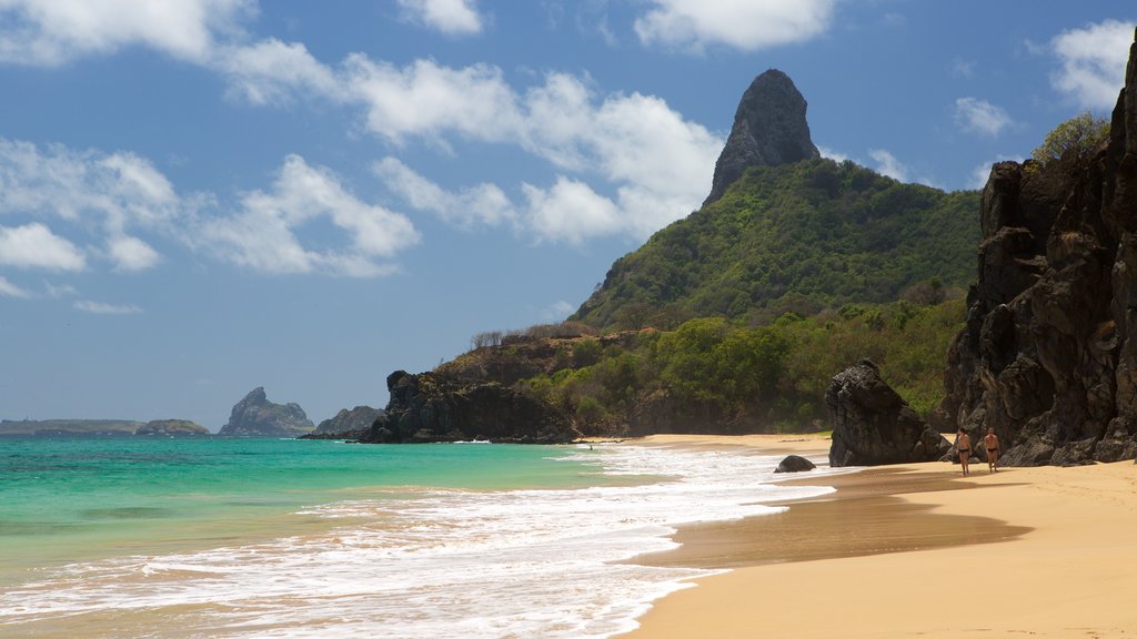 Cacimba do Padre Beach showing general coastal views, mountains and a beach