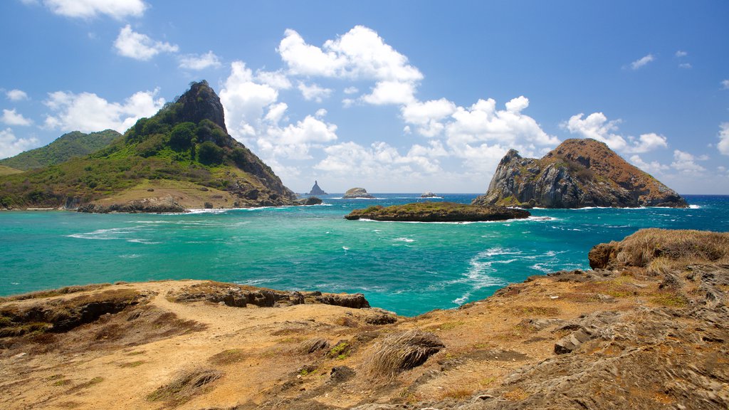 Fernando de Noronha which includes a sandy beach, mountains and general coastal views