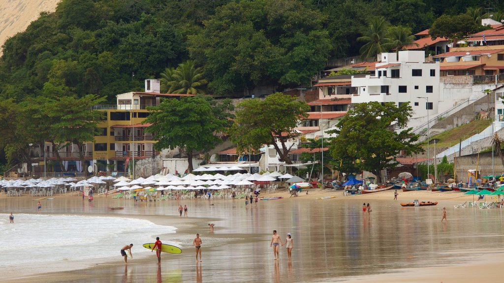 Ponta Negra Beach which includes a beach, a coastal town and general coastal views