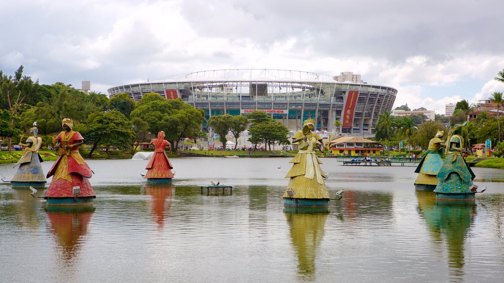 Fonte Nova Stadium which includes a lake or waterhole, a garden and a statue or sculpture