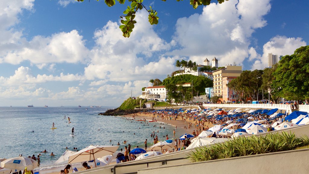 Porto da Barra strand som viser kystby, strand og kyst