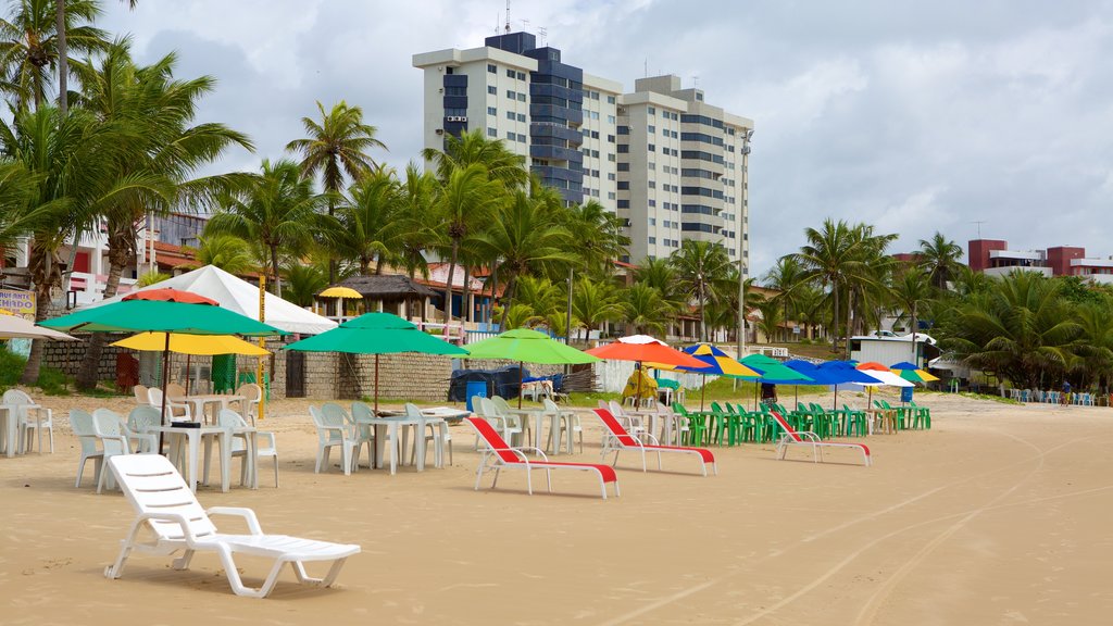 Pirangi Beach which includes a beach, general coastal views and a coastal town