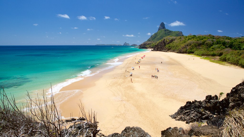 Cacimba do Padre Beach showing general coastal views, mountains and a sandy beach