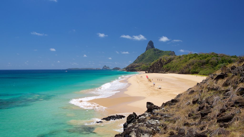 Cacimba do Padre Beach which includes a bay or harbour, mountains and general coastal views