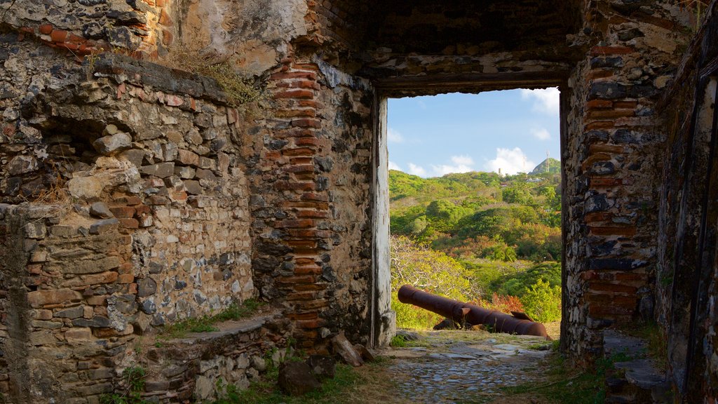 Remedios Fort showing building ruins, military items and heritage elements