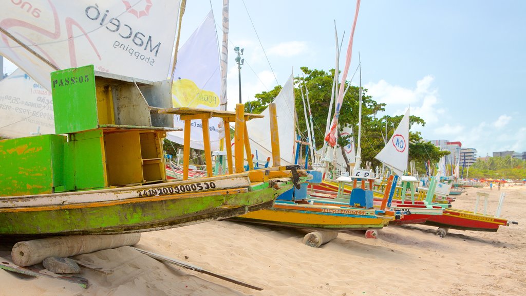 Pajucara Beach which includes general coastal views, boating and a sandy beach