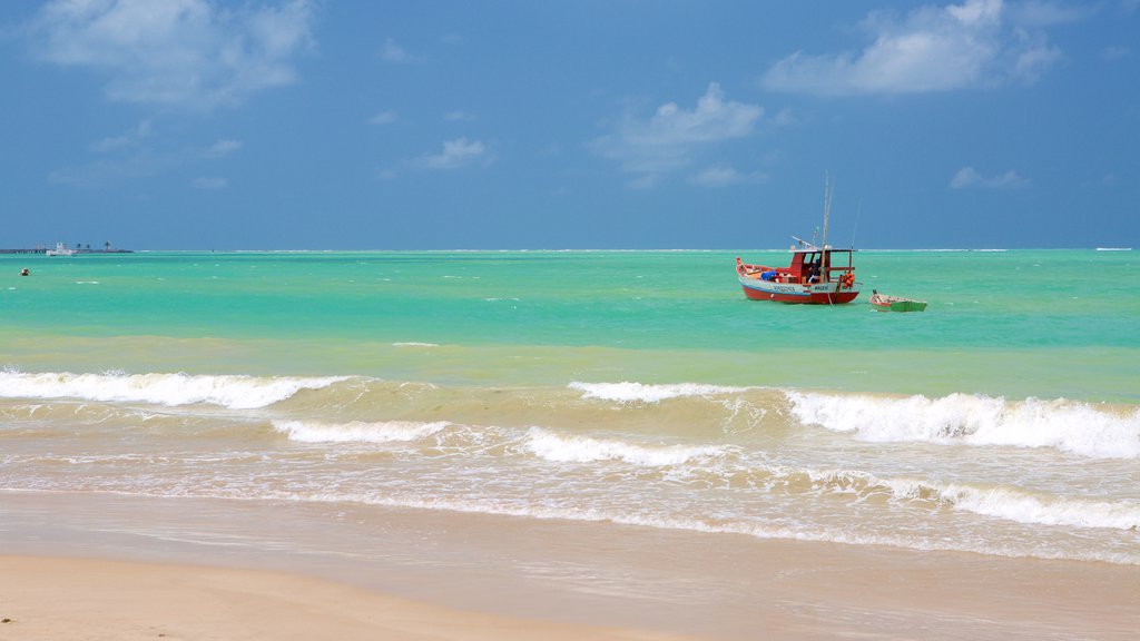 Pajucara Beach showing a beach, boating and fishing