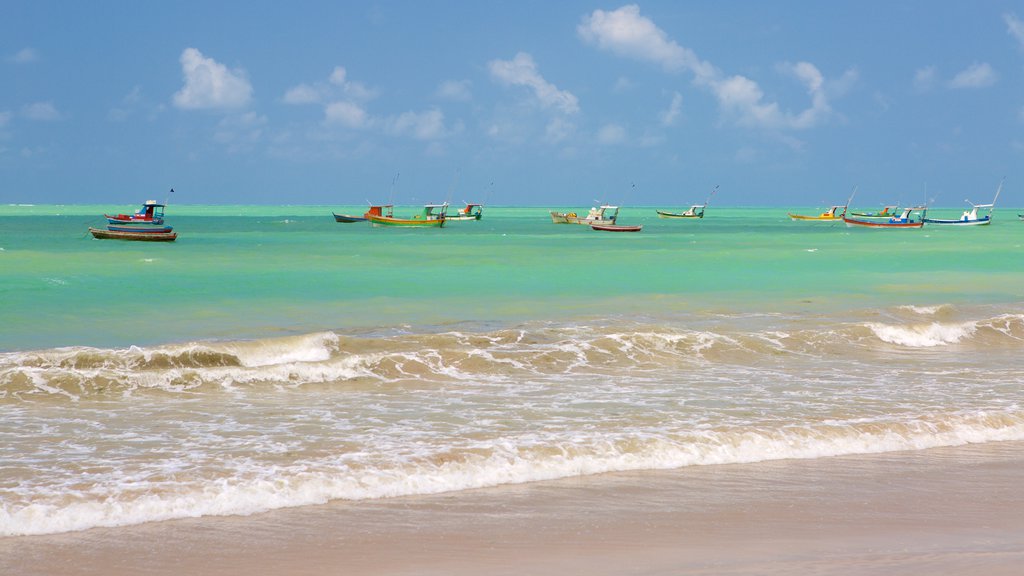 Pajucara Beach showing general coastal views, boating and a sandy beach