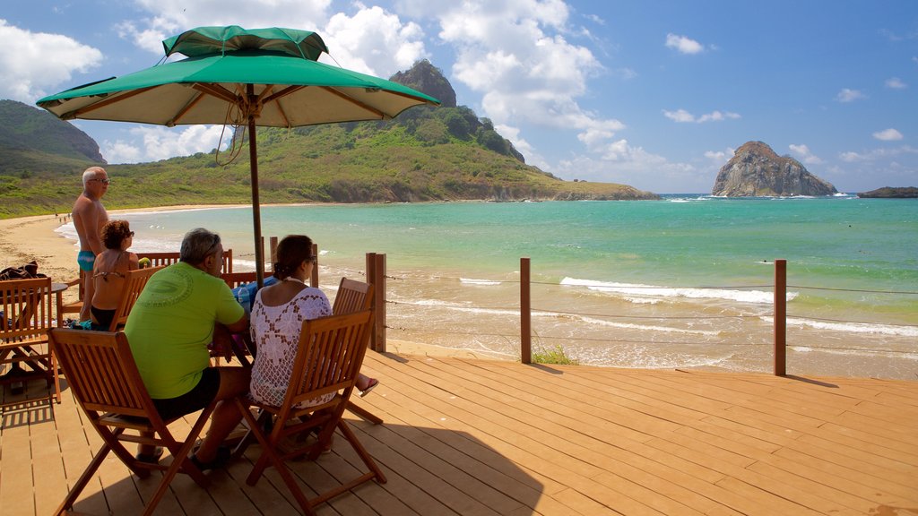 Sueste Beach showing a luxury hotel or resort, surf and mountains