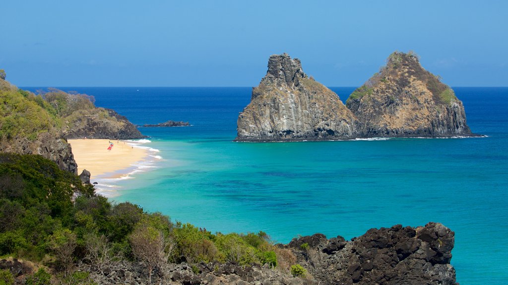 Dois Irmaos Hill showing a beach, general coastal views and rocky coastline