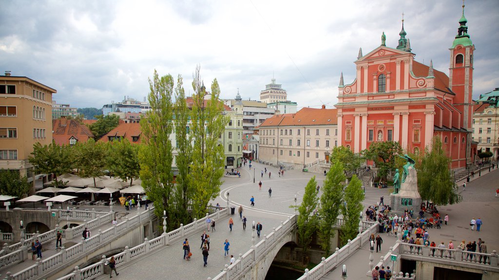 Triple Bridge which includes a city, a square or plaza and heritage architecture