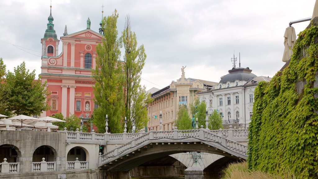 Triple Bridge featuring a city and a bridge