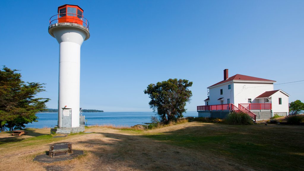 Gulf Islands featuring a lighthouse, a house and general coastal views