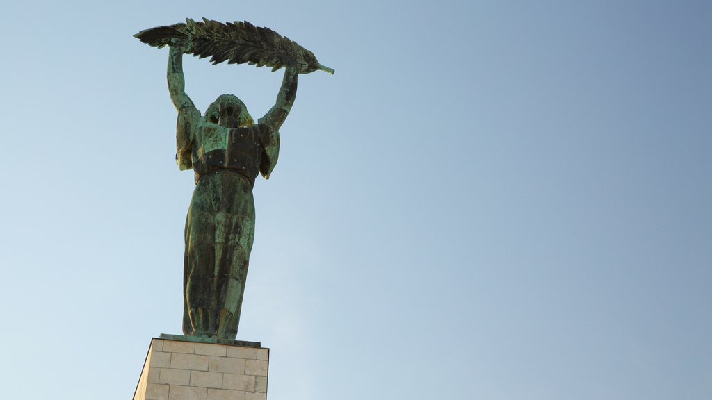 Liberty Statue featuring a monument and a statue or sculpture