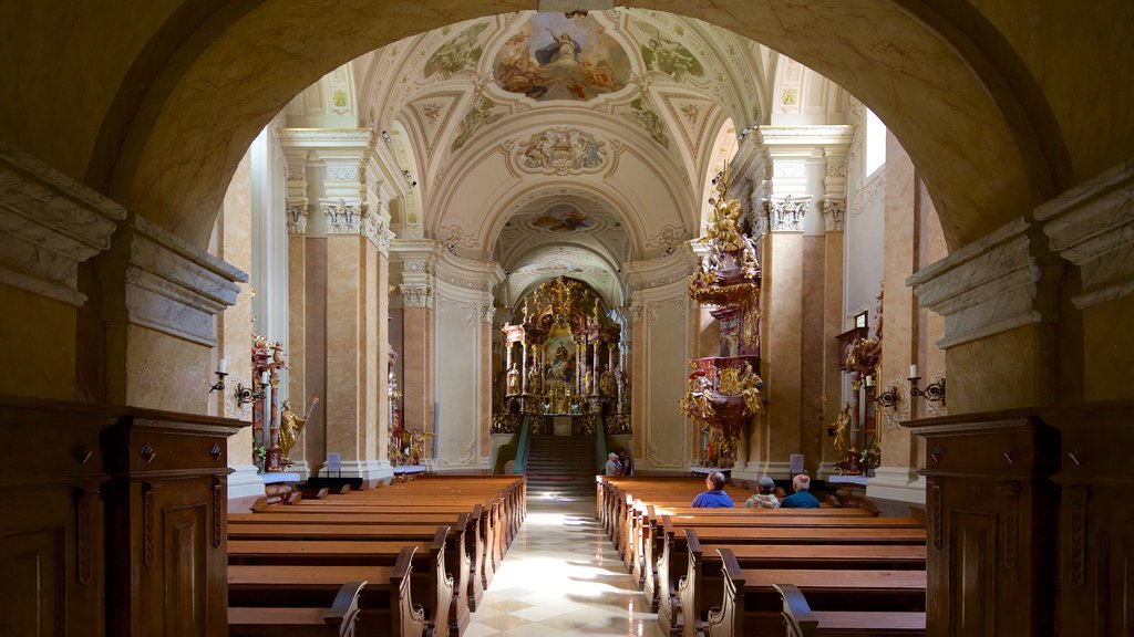 Tihany Abbey which includes religious elements, interior views and a church or cathedral