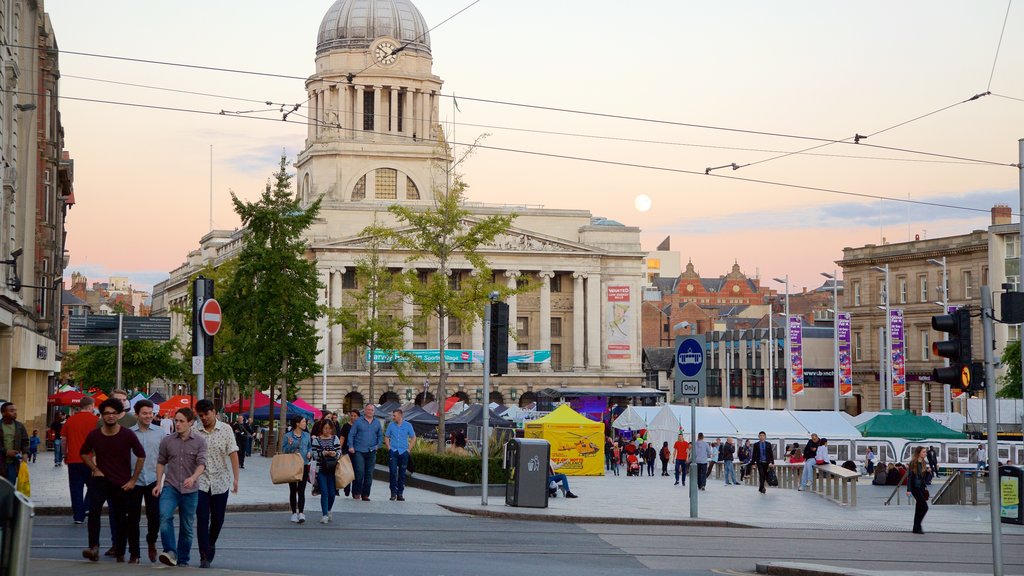 Old Market Square showing heritage architecture, markets and a sunset