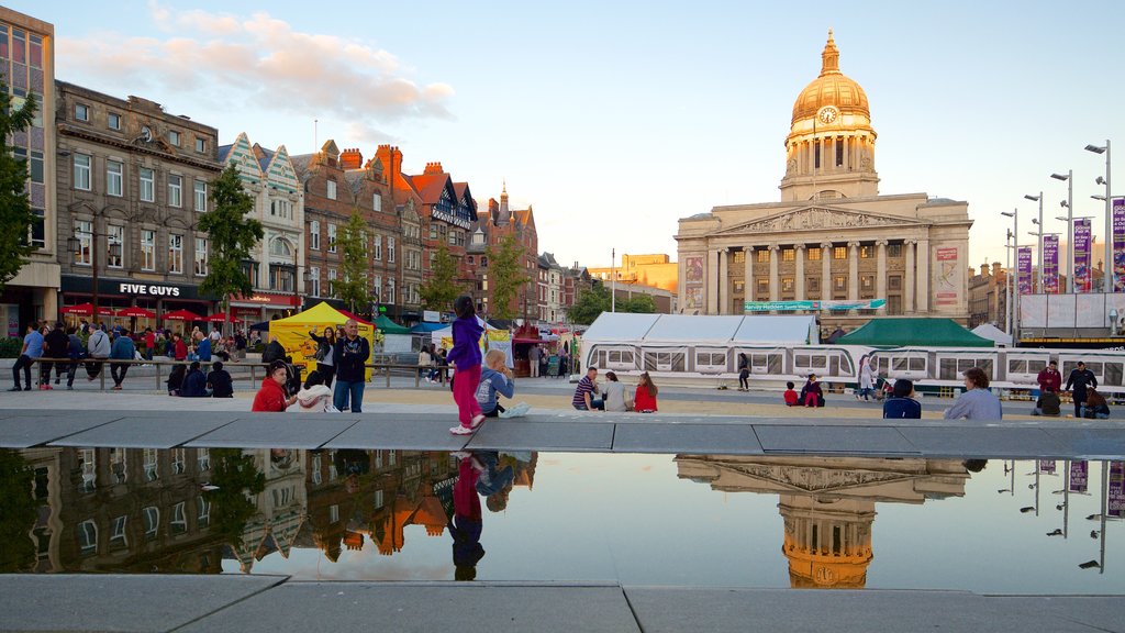 Old Market Square showing a city, markets and a river or creek