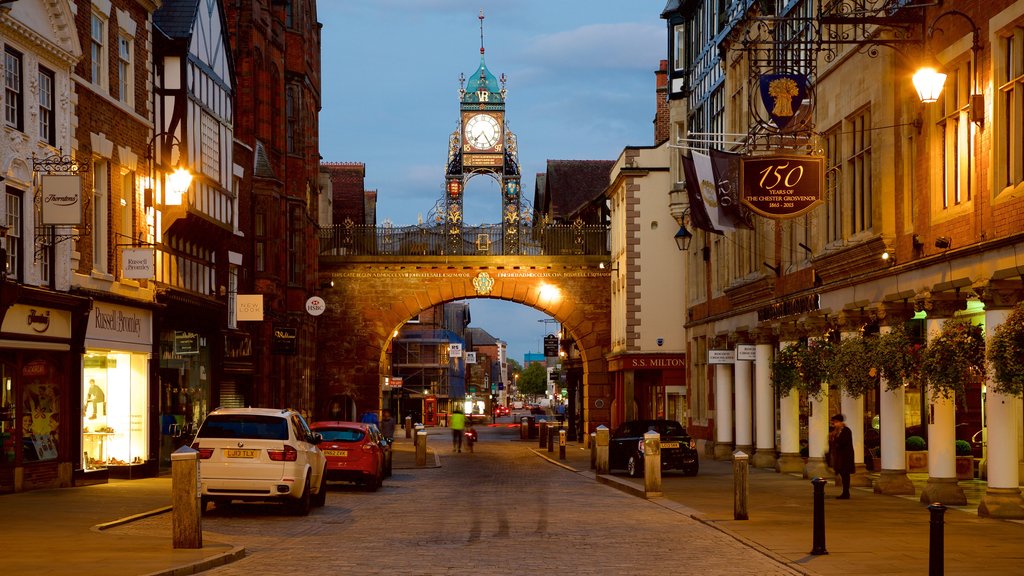 Eastgate Clock which includes a monument, street scenes and night scenes