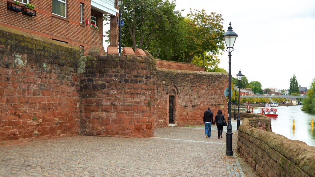 Chester City Walls showing heritage elements, a river or creek and château or palace