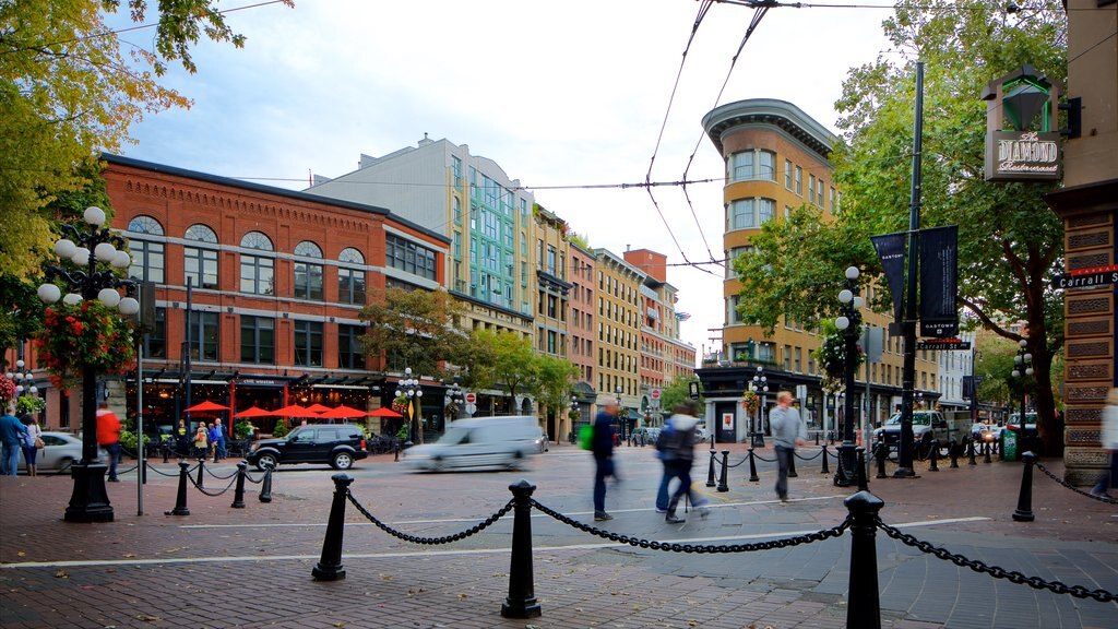 Gastown que incluye arquitectura patrimonial y imágenes de calles