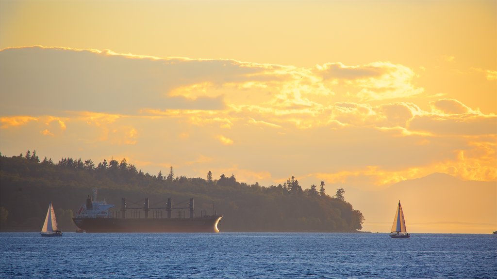 Stanley Park which includes a bay or harbour, a sunset and a ferry