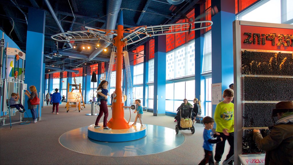 TELUS World of Science which includes interior views as well as a small group of people