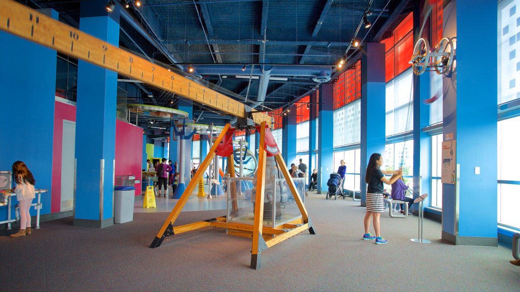 TELUS World of Science which includes interior views as well as a small group of people