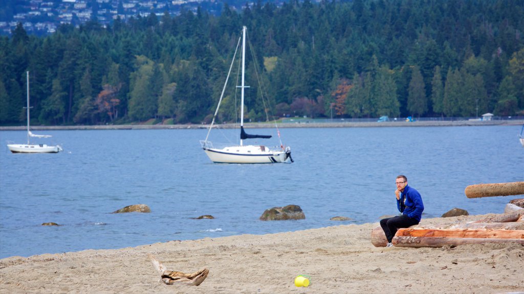 Kitsilano Beach featuring a bay or harbor, sailing and a garden