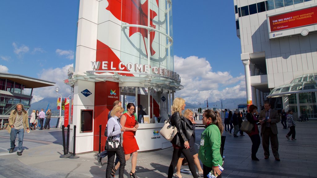 Canada Place which includes a square or plaza and an administrative building as well as a small group of people