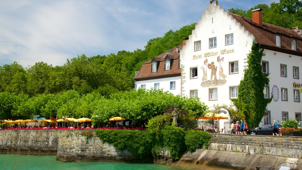 Meersburg montrant rivière ou ruisseau et sortie au restaurant