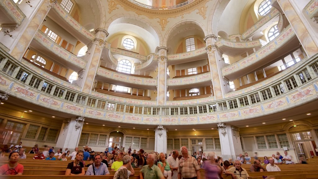 Church of Our Lady which includes interior views and a church or cathedral as well as a large group of people