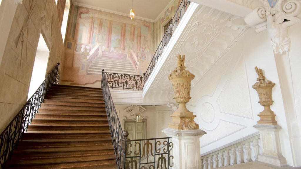 Ludwigsburg Palace which includes a castle and interior views