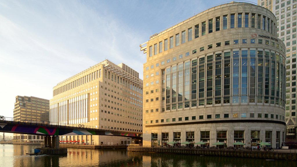 Canary Wharf which includes a bridge, city views and a river or creek