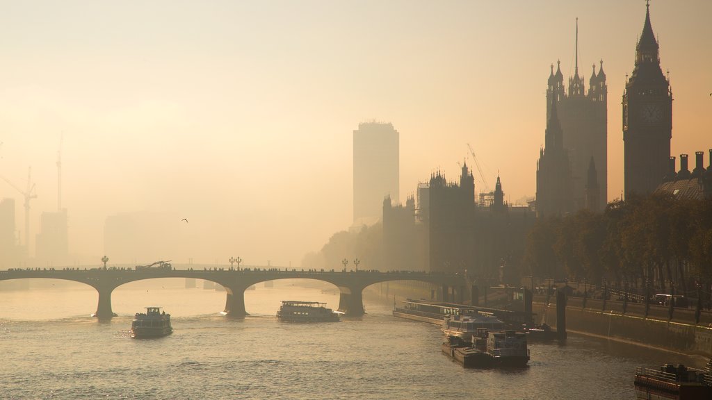 Houses of Parliament showing a river or creek, mist or fog and skyline