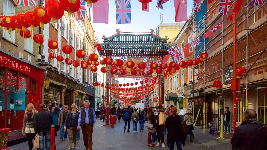 Chinatown which includes a city and street scenes as well as a large group of people