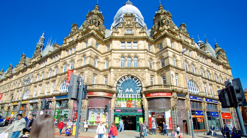 Leeds Kirkgate Market showing heritage architecture as well as a large group of people