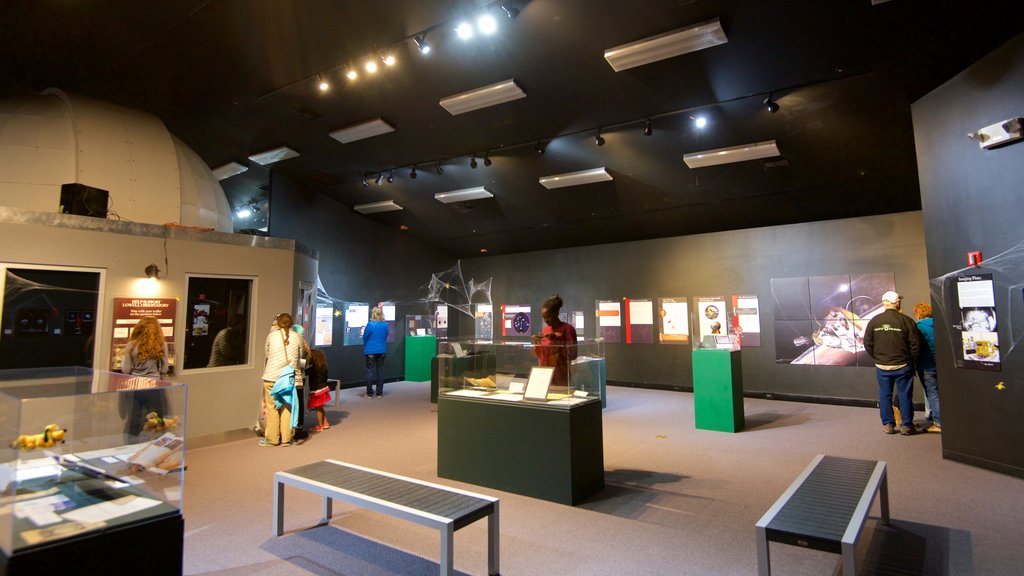 Lowell Observatory showing an observatory and interior views as well as a small group of people