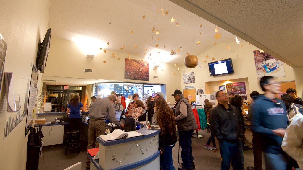 Lowell Observatory featuring an observatory and interior views as well as a small group of people