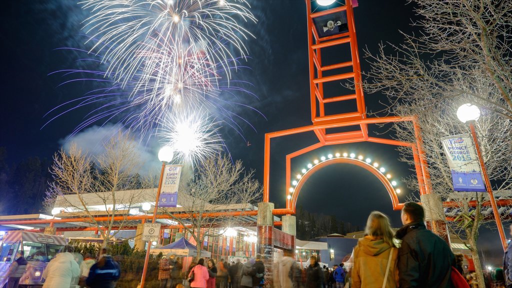 Prince George showing a festival and night scenes as well as a large group of people