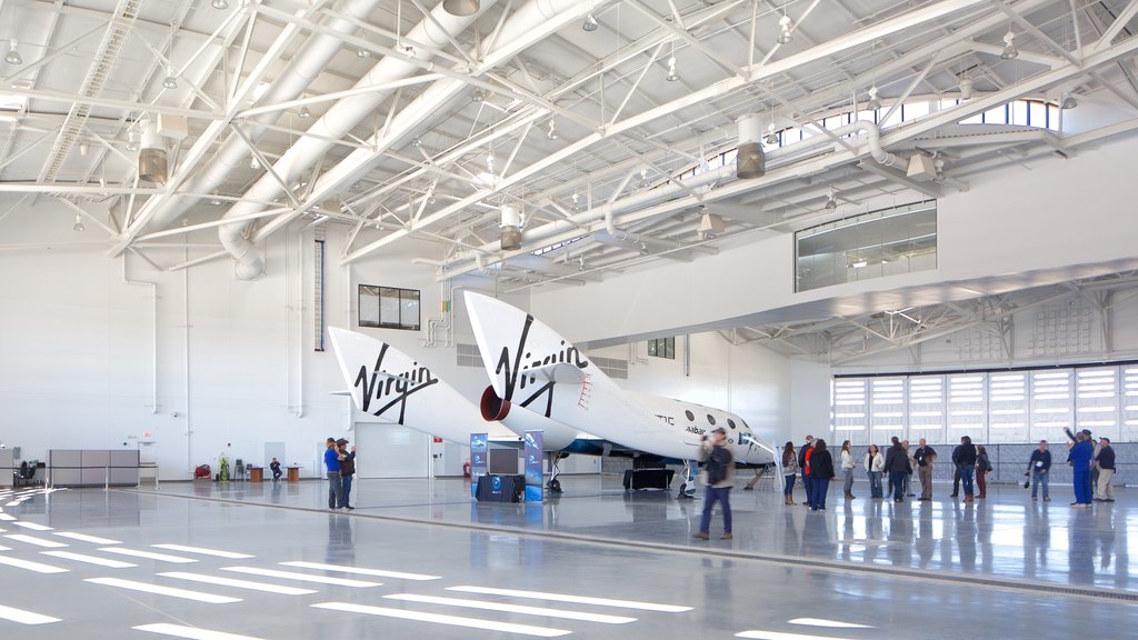 Spaceport America showing interior views, aircraft and industrial elements