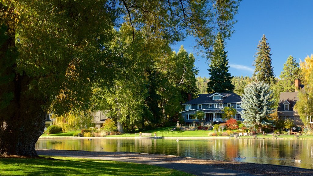 Drake Park which includes a garden and a pond