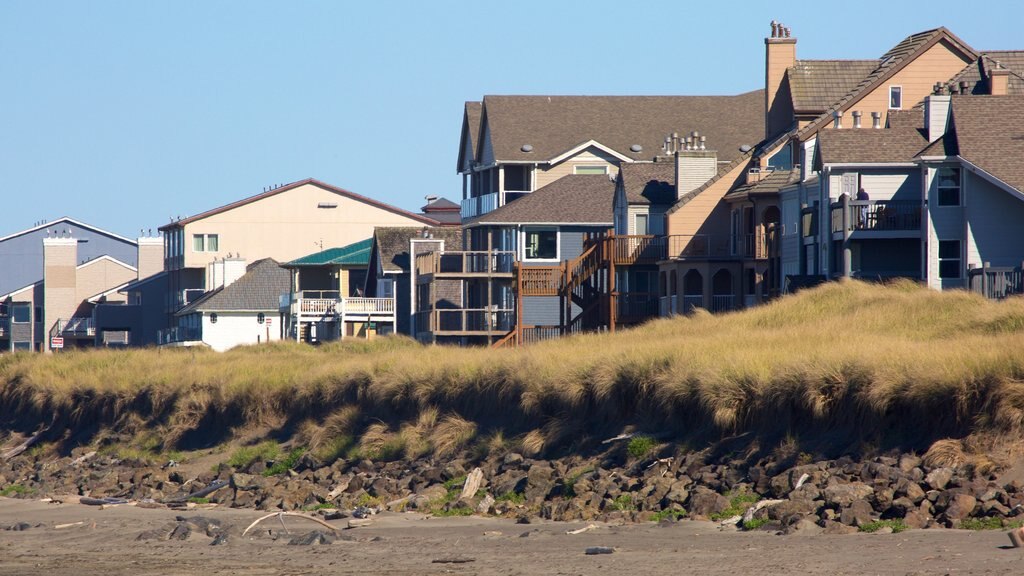 Ocean Shores Beach welches beinhaltet Strand und Haus