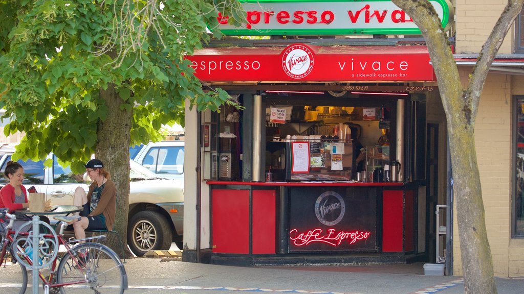 Capitol Hill showing signage, cafe scenes and street scenes