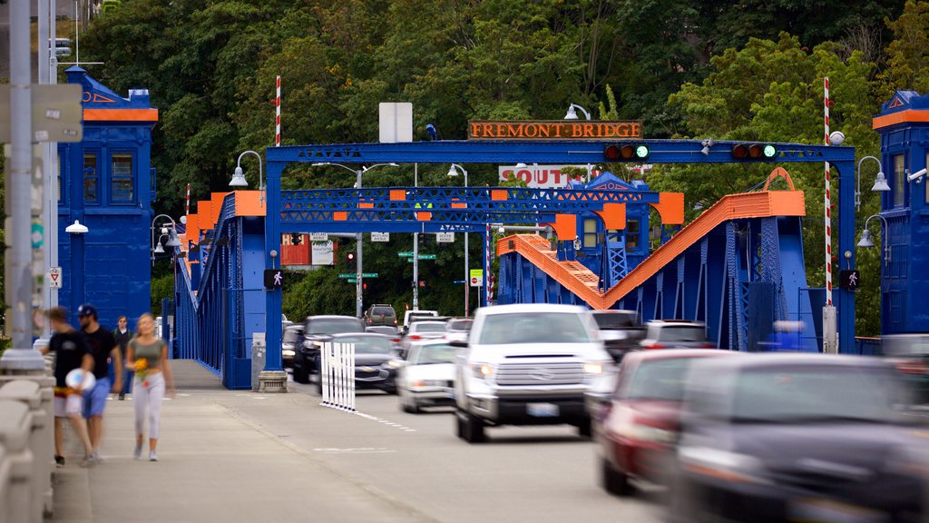 Fremont Bridge which includes signage, a bridge and street scenes